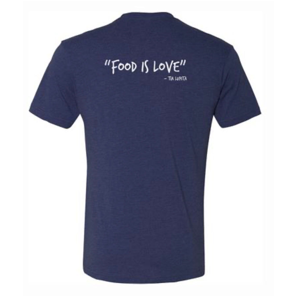 the back of a blue Tia Lupita shirt that says Food Is Love